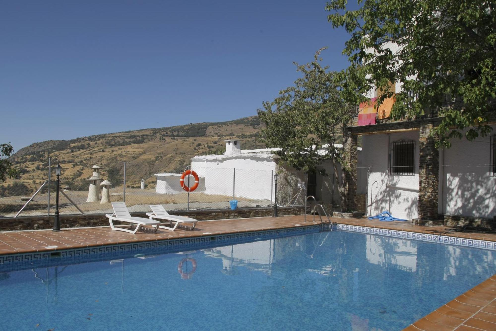קפיליירה Hostal Rural Poqueira מראה חיצוני תמונה